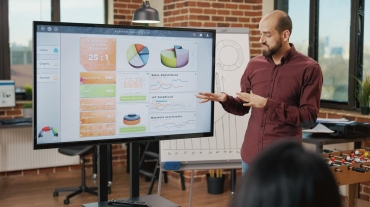 business-man-planning-strategy-startup-presentation-with-asian-women-boardroom-briefing-colleagues-about-new-ideas-job-partners-working-develop-financial-collaboration